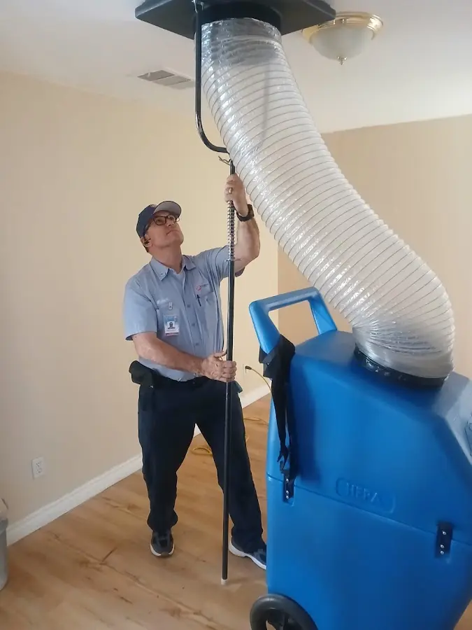 HVAC Installation technician using HEPA equipment in Hadley
